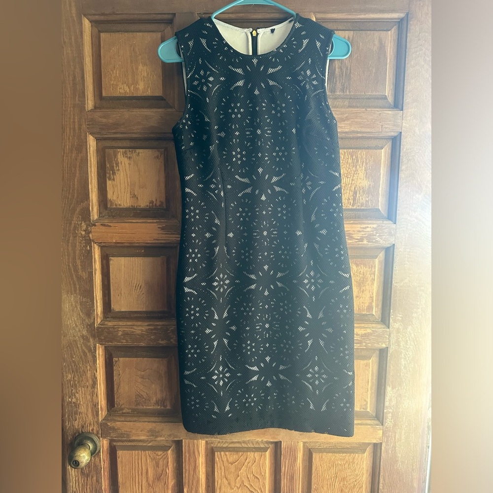 Black and white dress from cache but tag was cut out